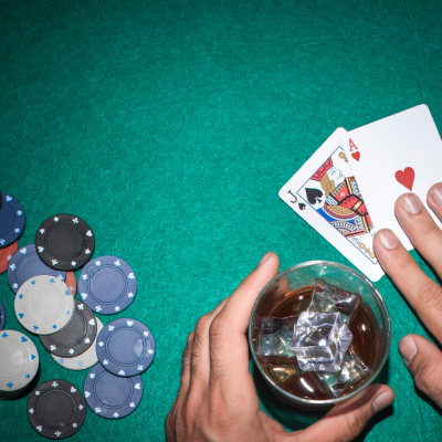 Casino table with chips and a playing cards
